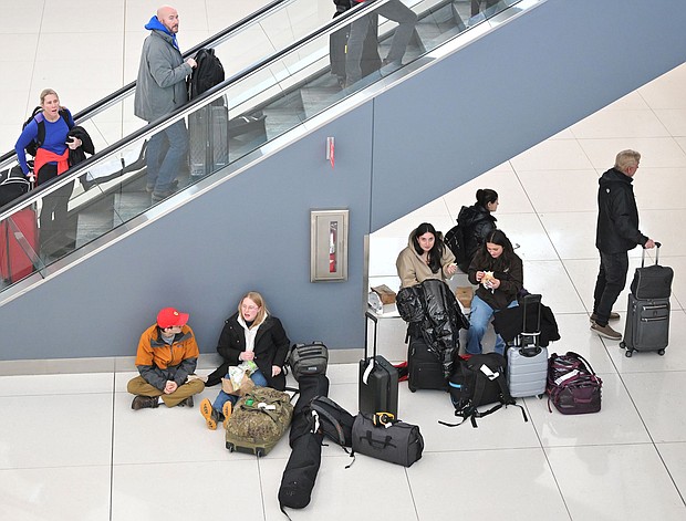 Over 320 flights have been canceled because of a winter storm that brought snow and freezing temperatures to Denver International Airport in Denver, Colorado on January 15.
Mandatory Credit:	RJ Sangosti/MediaNews Group/The Denver Post/Getty Images