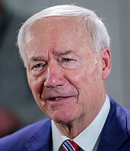 Then-Arkansas Gov. Asa Hutchinson speaks during an interview with the Associated Press, December 13, 2022, in Washington. Hutchinson announced January 16 he’s ending his presidential campaign following a dismal showing in Monday night’s Iowa caucuses, which were dominated by former President Donald Trump.
Mandatory Credit:	Pablo Martinez Monsivais/AP/File