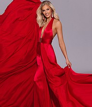 Miss Colorado, Madison March, poses in her evening gown. "In her free time, Madison enjoys flying planes, cooking pasta, and reading," her Miss Colorado biography reads.
Mandatory Credit:	Carlos Velez Studio/Courtesy Miss America