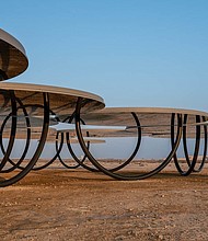 Eliasson says the structures are designed to draw people in and encourage them to contemplate their surroundings.
Mandatory Credit:	Dimitris Sideridis