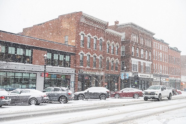 Snow falls on parked cars in Concord, New Hampshire, on January 16.
Mandatory Credit:	Will Lanzoni/CNN
