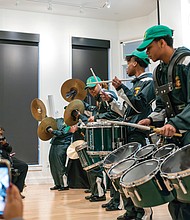Members of the Henrico High School Drumline gained the crowd’s approval for their rousing performance.