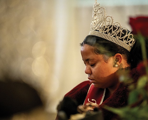 Michelle Wilkerson, VUU’s 2023-2024 Miss 1865, bows her head in prayer during 46th Annual Dr. Martin Luther King Jr. Community Leaders Celebration hosted by Virginia Union University at the Downtown Richmond Marriott on Friday, Jan 12. VUU was founded in 1865.