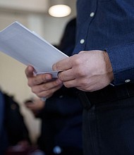 A job seeker attends a Veteran Employment and Resource Fair in Long Beach, California, on January 9. The number of Americans making first-time claims for jobless benefits dropped last week to a level not seen since the fall of 2022.
Mandatory Credit:	Eric Thayer/Bloomberg/Getty Images