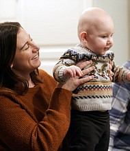 Rachael Gambino, Garrett Mazzeo and nine-month-old Miles are pictured at their home in Lansdale, Pennsylvania.
Mandatory Credit:	Deborah Brunswick/John General/CNN