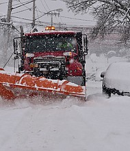 A snow plow clears the streets of heavy snow Thursday in Lackawanna, New York. The suburb of Buffalo was one of the areas hit the hardest by a lake-effect snowstorm this week.
Mandatory Credit:	John Normile/Getty Images
