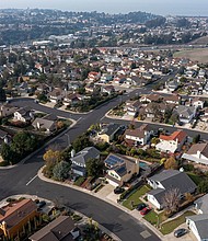 US home sales in 2023 dropped to their lowest level in nearly 30 years, but prices still soared to record highs.
Mandatory Credit:	David Paul Morris/Bloomberg/Getty Images