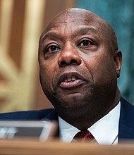 Sen. Tim Scott speaks during a Senate Banking, Housing, and Urban Affairs Committee hearing on January 11. Scott is expected to endorse Donald Trump on January 19 in New Hampshire, a source familiar told CNN.
Mandatory Credit:	Tom Williams/CQ-Roll Call, Inc via Getty Images