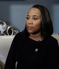 The special prosecutor hired by Fulton County District Attorney Fani Willis, seen here in Atlanta, Georgia on December 12, 2023, to pursue the criminal case against former President Donald Trump bought tickets for Willis to accompany him on at least two out-of-state trips, records show.
Mandatory Credit:	Brynn Anderson/AP