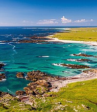 Visitors to Tiree have to take a four-hour ferry ride to get there.
Mandatory Credit:	Richard Kellett/Adobe Stock