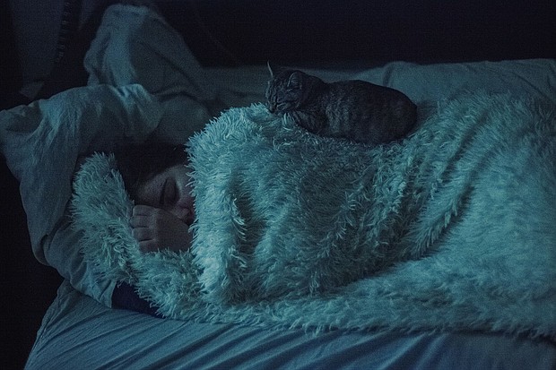 Sleeping more in the winter could be due to seasonal or behavioral causes.
Mandatory Credit:	Dmytro Betsenko/Moment RF/Getty Images