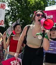 Abortion rights demonstrators rally to mark the first anniversary of the US Supreme Court ruling overturning Roe v. Wade in Washington, DC, on June 24, 2023.
Mandatory Credit:	Andrew Caballero-Reynolds/AFP via Getty Images