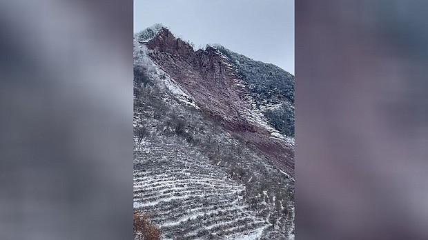 A landslide in Liangshui, southwestern China, seen in a screengrab from a social media video on January 22.
Mandatory Credit:	Reuters