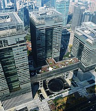 This aerial photo shows the Shanghai Financial Exchange Square in Shanghai, China, on December 5. Chinese stocks are having their worst start to a year since 2016.
Mandatory Credit:	Costfoto/NurPhoto/Getty Images