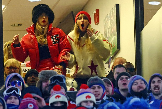 Taylor Swift (right) and Brittany Mahomes react after Kansas City Chiefs tight end Travis Kelce (not pictured) scores a touchdown in the 2024 AFC divisional round game against the Buffalo Bills at Highmark Stadium on January 21.
Mandatory Credit:	Mark J. Rebilas/USA TODAY Sports/Reuters