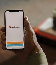 TurboTax is displayed on a device in this file 2018 photo. The Federal Trade Commission ruled in a final order and opinion Monday that TurboTax engaged in deceptive advertising and banned the company from advertising its services for free unless it is free for all customers.
Mandatory Credit:	Kimberly White/Getty Images