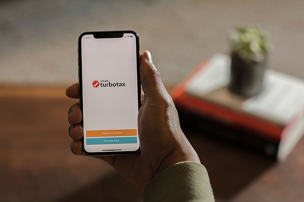TurboTax is displayed on a device in this file 2018 photo. The Federal Trade Commission ruled in a final order and opinion Monday that TurboTax engaged in deceptive advertising and banned the company from advertising its services for free unless it is free for all customers.
Mandatory Credit:	Kimberly White/Getty Images