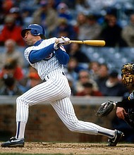 Chicago Cubs Hall of Famer Ryne Sandberg announced Monday he has been diagnosed with metastatic prostate cancer and has begun treatment. In this file photo, he bats against the Pittsburgh Pirates during a Major League Baseball game circa 1992.
Mandatory Credit:	Focus On Sport/Getty Images