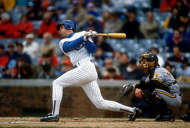 Chicago Cubs Hall of Famer Ryne Sandberg announced Monday he has been diagnosed with metastatic prostate cancer and has begun treatment. In this file photo, he bats against the Pittsburgh Pirates during a Major League Baseball game circa 1992.
Mandatory Credit:	Focus On Sport/Getty Images