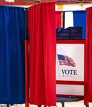 A voting booth at a polling station inside Plymouth Elementary School in Plymouth, New Hampshire, on Tuesday, January 23.
Mandatory Credit:	Al Drago/Bloomberg/Getty Images