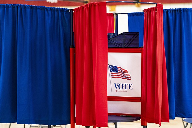 A voting booth at a polling station inside Plymouth Elementary School in Plymouth, New Hampshire, on Tuesday, January 23.
Mandatory Credit:	Al Drago/Bloomberg/Getty Images