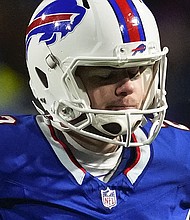 Buffalo Bills placekicker Tyler Bass reacts after missing a field goal against the Kansas City Chiefs during the fourth quarter of an NFL AFC division playoff football game Sunday, January 21.
Mandatory Credit:	Frank Franklin II/AP