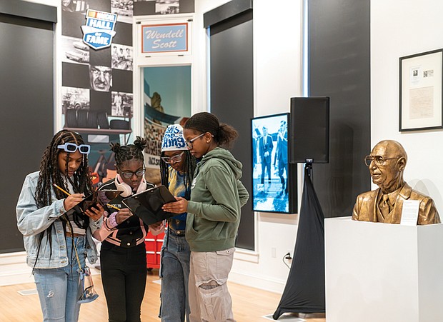 Carrie Williams, 10; Madison Williams, 10; Maleah Hobson, 13; and Threvia Slayton, 15, participate in a scavenger hunt during the Black History Museum’s annual teen-focused Martin Luther King Jr. Community Day on Jan. 13.