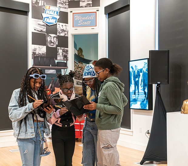 Carrie Williams, 10; Madison Williams, 10; Maleah Hobson, 13; and Threvia Slayton, 15, participate in a scavenger hunt during the Black History Museum’s annual teen-focused Martin Luther King Jr. Community Day on Jan. 13.