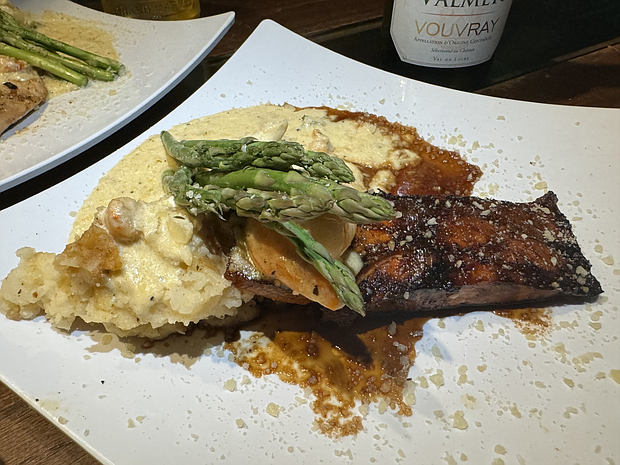 Steak Night at The Savoy also offers a Salmon Steak special as a red meat alternative choice.   

Photos: Courtesy of The Savoy