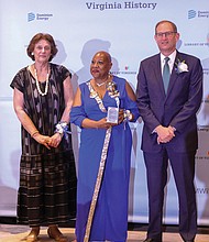 Robert Blue, chairman, president and CEO of Dominion, right, stands with Sandra Treadway, left, librarian of Virginia, and Danita Gail Wilkinson, middle, COO of the R.R. Wilkinson Foundation that is named after her father, the late Rev. Raymond Rogers Wilkinson, the Baptist minister and civil rights leader.
Rev. Wilkinson and several other Virginians were honored during Dominion’s and the Library of Virginia’s “Strong Men & Women in Virginia History” awards program June 15 at the Hilton Richmond Hotel and Spa.