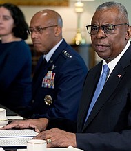 Defense Secretary Lloyd Austin, right, speaks during a meeting with NATO Secretary General Jens Stoltenberg, not pictured, at the Pentagon in Washington, DC, on Monday.
Mandatory Credit:	Susan Walsh/AP