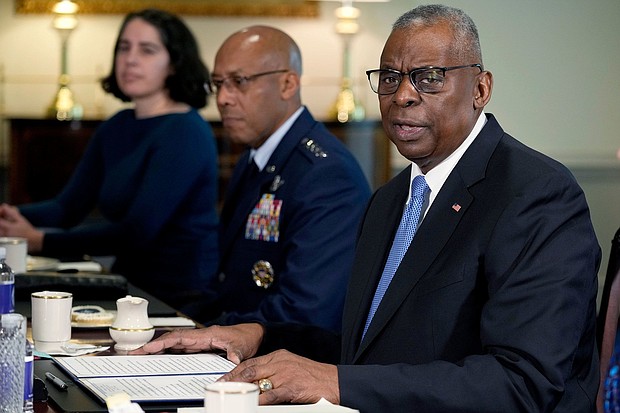 Defense Secretary Lloyd Austin, right, speaks during a meeting with NATO Secretary General Jens Stoltenberg, not pictured, at the Pentagon in Washington, DC, on Monday.
Mandatory Credit:	Susan Walsh/AP