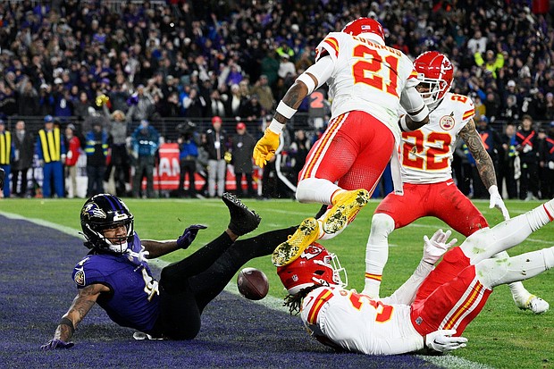 Baltimore Ravens wide receiver Zay Flowers (4) falls as he fumbles into the end zone for a touchback against the Kansas City Chiefs during the second half of the AFC Championship NFL football game, Sunday, Jan. 28, 2024, in Baltimore.
Mandatory Credit:	Nick Wass/AP