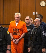 Alex Murdaugh, second from left, is brought out into the courtroom during a jury-tampering hearing at the Richland County Judicial Center, Monday, January 29, in Columbia, South Carolina.
Mandatory Credit:	Andrew J. Whitaker/The Post And Courier/Pool/AP