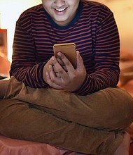Parents should look for ways to bridge kids' online and offline lives, experts say. Connecting online can be a lifesaver for boys who don't find friendship at school.
Mandatory Credit:	Mayur Kakade/Moment RF/Getty Images