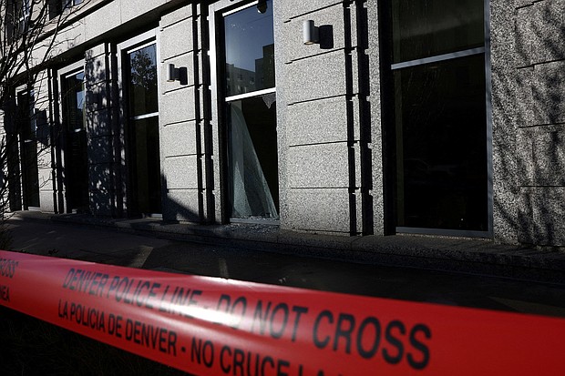 Police tape surrounds an area where a man broke into the Colorado Supreme Court building and barricaded himself inside overnight in Denver, Colorado.
Mandatory Credit:	Kevin Mohatt/Reuters