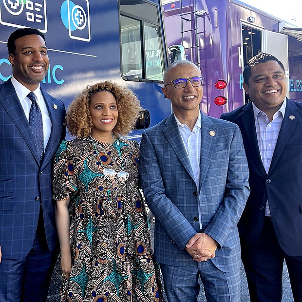 Council Members Edward Pollard, Tiffany Thomas, and Joaquin Martinez with Harris Health System President and CEO Dr. Esmaeil Porsa