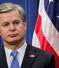 FBI Director Christopher Wray looks on during a press conference at the U.S. Department of Justice on December 6, 2023 in Washington, DC.
Mandatory Credit:	Samuel Corum/Getty Images/File