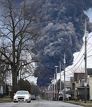 A black plume rises over East Palestine, Ohio, on Monday, February 6, 2023.
Mandatory Credit:	Gene J. Puskar/AP