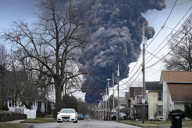 A black plume rises over East Palestine, Ohio, on Monday, February 6, 2023.
Mandatory Credit:	Gene J. Puskar/AP