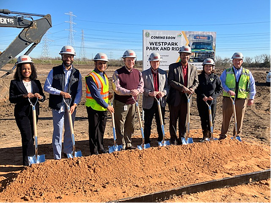 Pictured from left to right: Sarah Coulter (Assistant Transit Director), Fort Bend County Commissioner Dexter McCoy, Fort Bend County Judge KP George, Fort Bend County Commissioner Vincent Morales, Fort Bend County Commissioner Andy Meyers, Fort Bend County Commissioner Grady Prestage, Perri D’Armond (Transit Director), David Ajlani (SpawGlass Operations Manager)