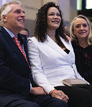 The mayor’s wife, Brandi Stoney, is seated next to former Virginia Go. Terry McAuliffe and her mother, JoAnne Washington.