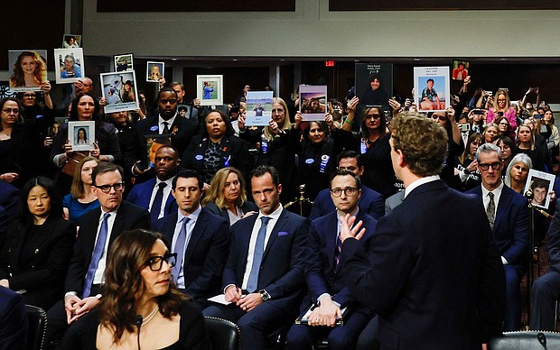 Meta's CEO Mark Zuckerberg stands and faces the audience as he testifies during the Senate Judiciary Committee hearing on online child sexual exploitation at the U.S. Capitol in Washington, U.S., January 31.
Mandatory Credit:	Evelyn Hockstein/Reuters