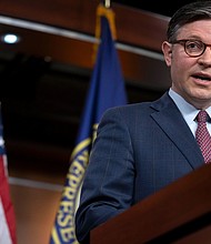House Speaker Mike Johnson speaks during a news conference on Capitol Hill on January 30.
Mandatory Credit:	Mark Schiefelbein/AP