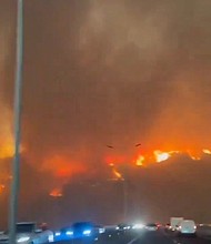 Lines of traffic on Route 68, a road leading to the coast.
Mandatory Credit:	Bomberos de Chile