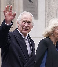King Charles and Queen Camilla are seen here leaving a London hospital last week.
Mandatory Credit:	Alberto Pezzali/AP