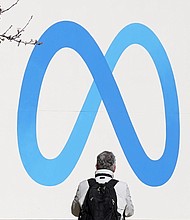 Meta to add ‘AI generated’ label to images created with OpenAI, Midjourney and other tools
Mandatory Credit:	Jeff Chiu/AP