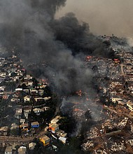 Aerial view of the forest fire on the hills of the city of Viña del Mar, Chile, on February 3, 2024.
Mandatory Credit:	Javier Torres/AFP/Getty Images