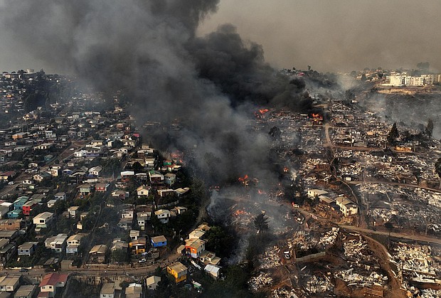 Aerial view of the forest fire on the hills of the city of Viña del Mar, Chile, on February 3, 2024.
Mandatory Credit:	Javier Torres/AFP/Getty Images