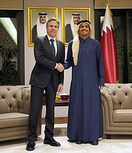 U.S. Secretary of State Antony Blinken shakes hands with Qatar's Prime Minister and Foreign Affairs Minister Mohammed Bin Abdulrahman Al Thani, at Diwan Annex, in Doha, Qatar, on February 6, 2024.
Mandatory Credit:	Mark Schiefelbein/Pool via Reuters